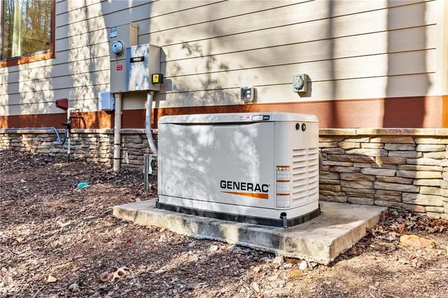 a view of a roof deck with table and chairs under an umbrella