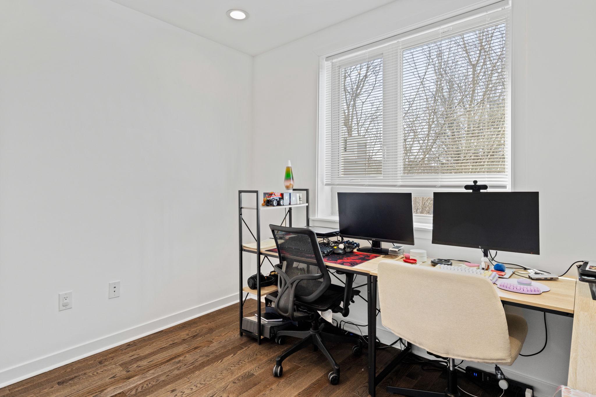 2924 Wharton Street Philadelphia, PA 19146 - Photo 15 of 29 a view of a workspace with furniture and a window