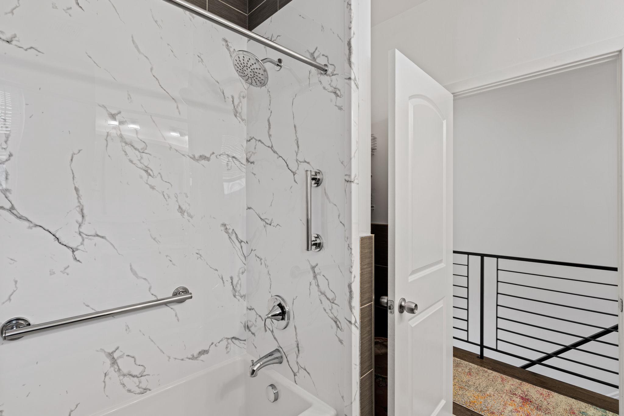 2924 Wharton Street Philadelphia, PA 19146 - Photo 18 of 29 a bathroom with a bathtub and shower