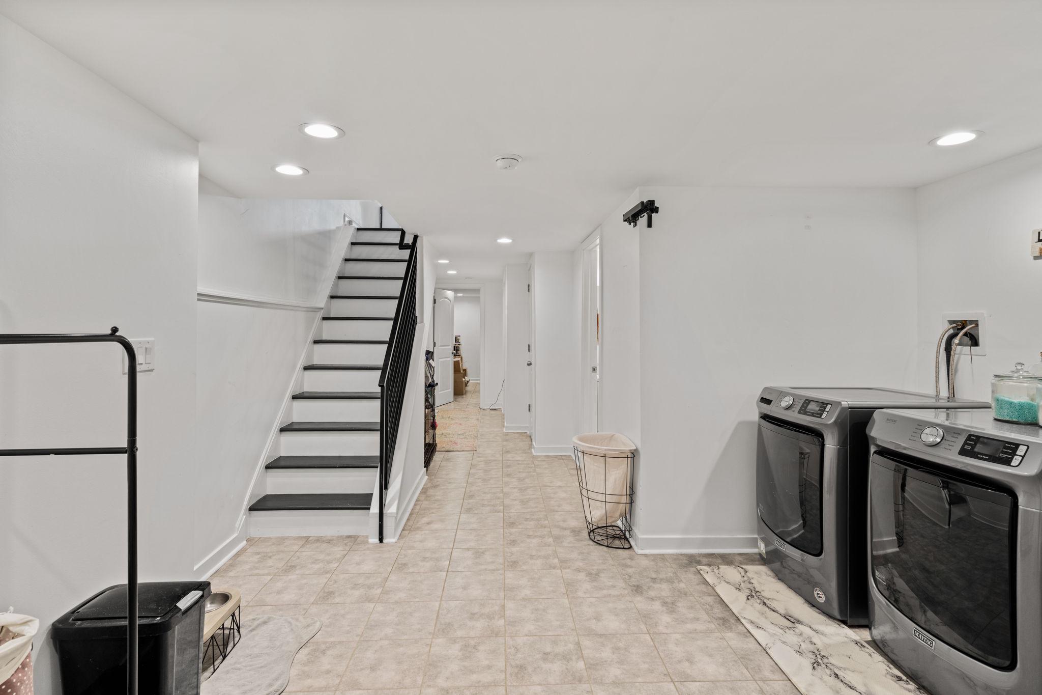 2924 Wharton Street Philadelphia, PA 19146 - Photo 20 of 29 a view of a livingroom with furniture and staircase