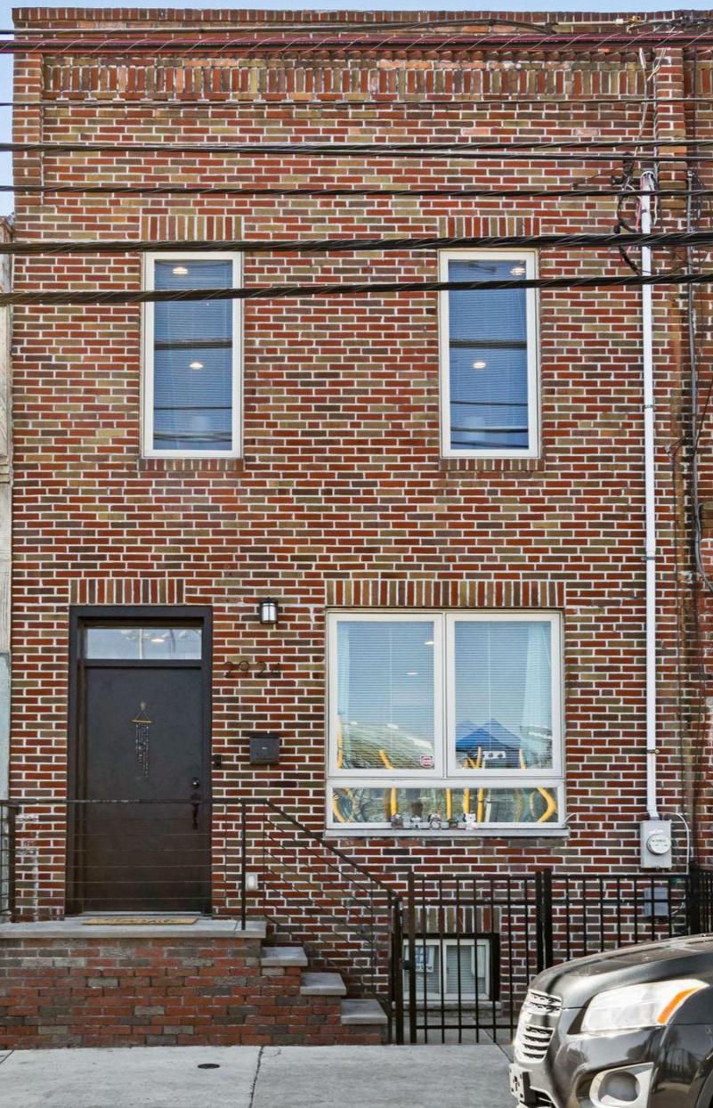 2924 Wharton Street Philadelphia, PA 19146 - Photo 27 of 29 a brick building with a door