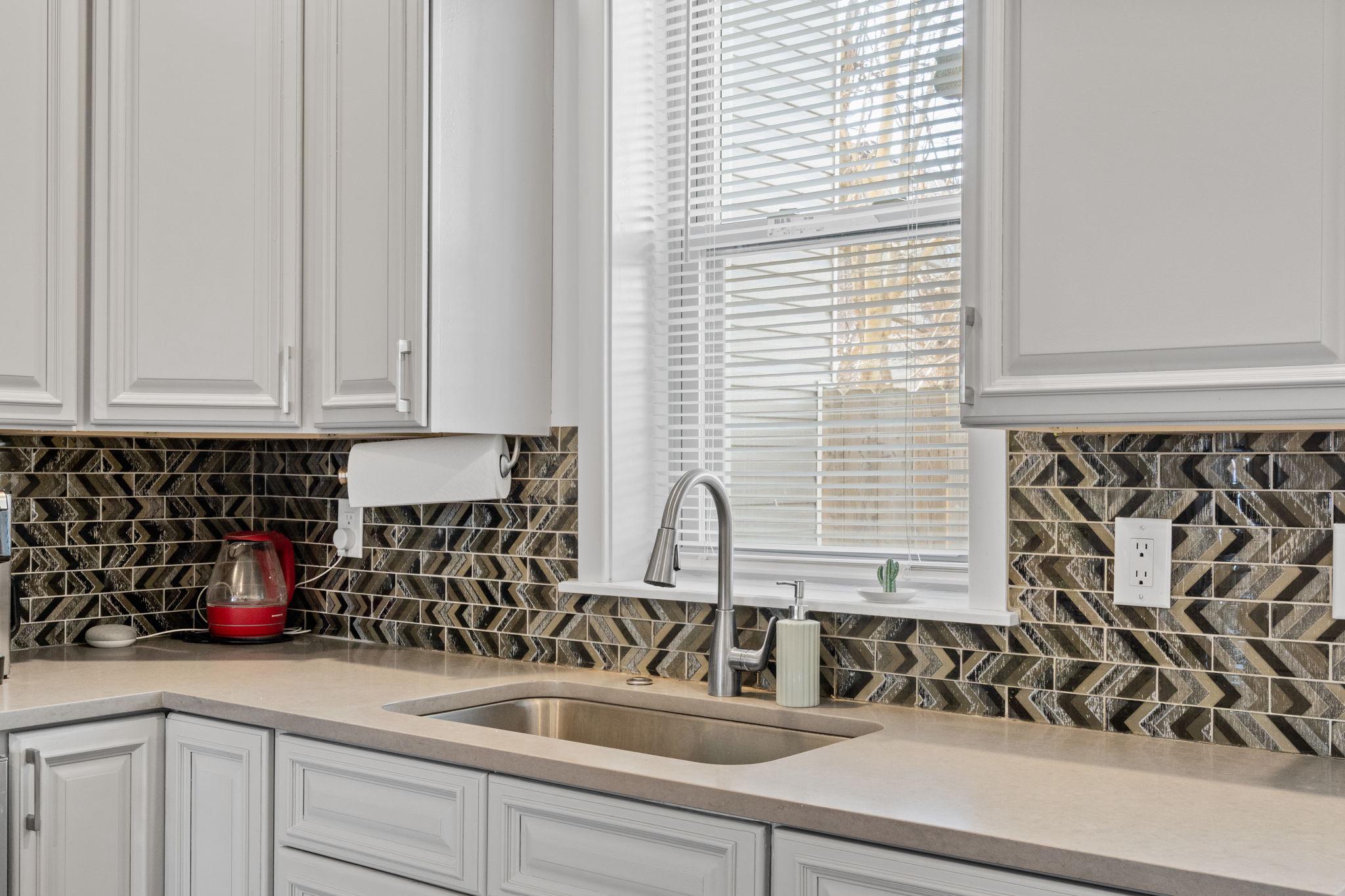 2924 Wharton Street Philadelphia, PA 19146 - Photo 10 of 29 a kitchen with a sink and cabinets