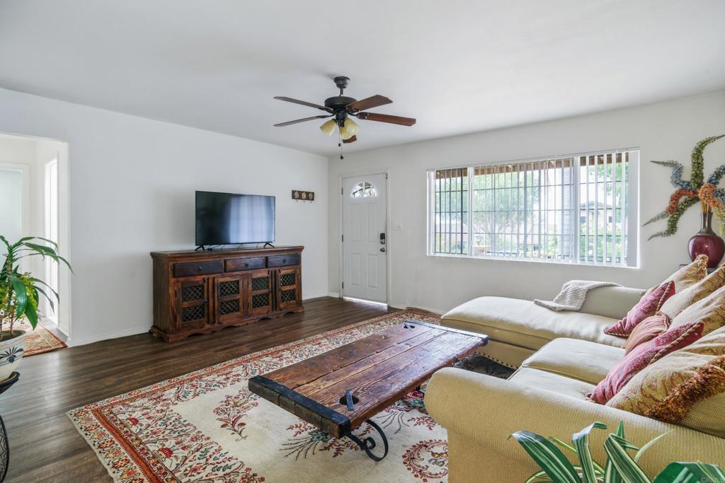 306 Fowles Street Oceanside, CA 92054 - Photo 11 of 29 a living room with furniture and a flat screen tv