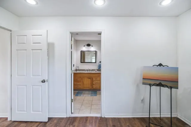 a bedroom with bed and window