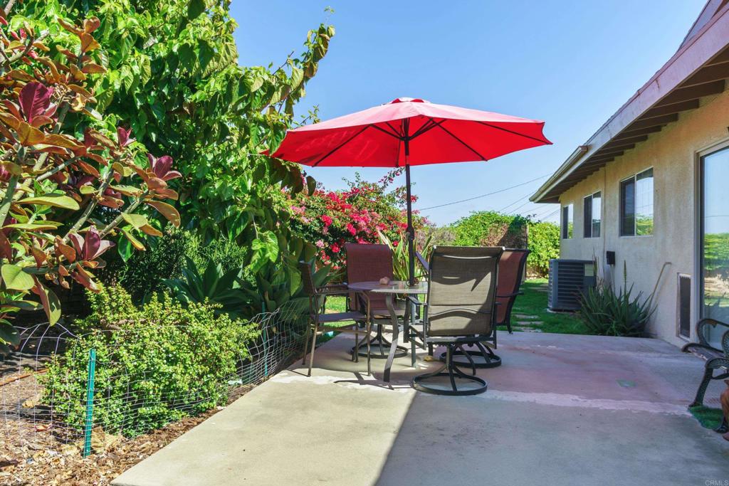306 Fowles Street Oceanside, CA 92054 - Photo 25 of 29 an outdoor space with furniture and umbrella