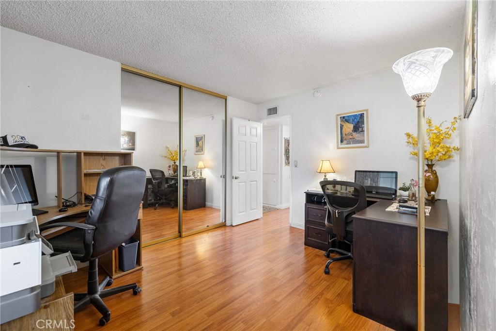 2158 Waldo Street Simi Valley, CA 93065 - Photo 16 of 46 a workspace with wooden floor and a workspace
