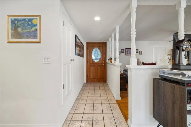 a hallway with washer and dryer