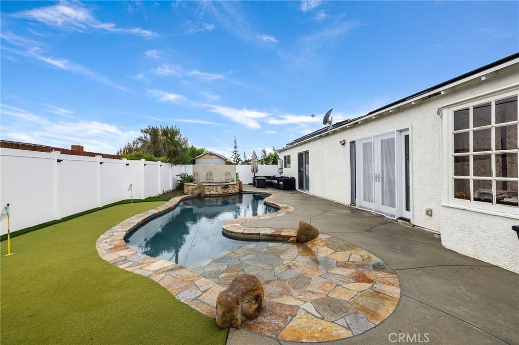 2158 Waldo Street Simi Valley, CA 93065 - Photo 35 of 46 a view of a backyard with chair and tables