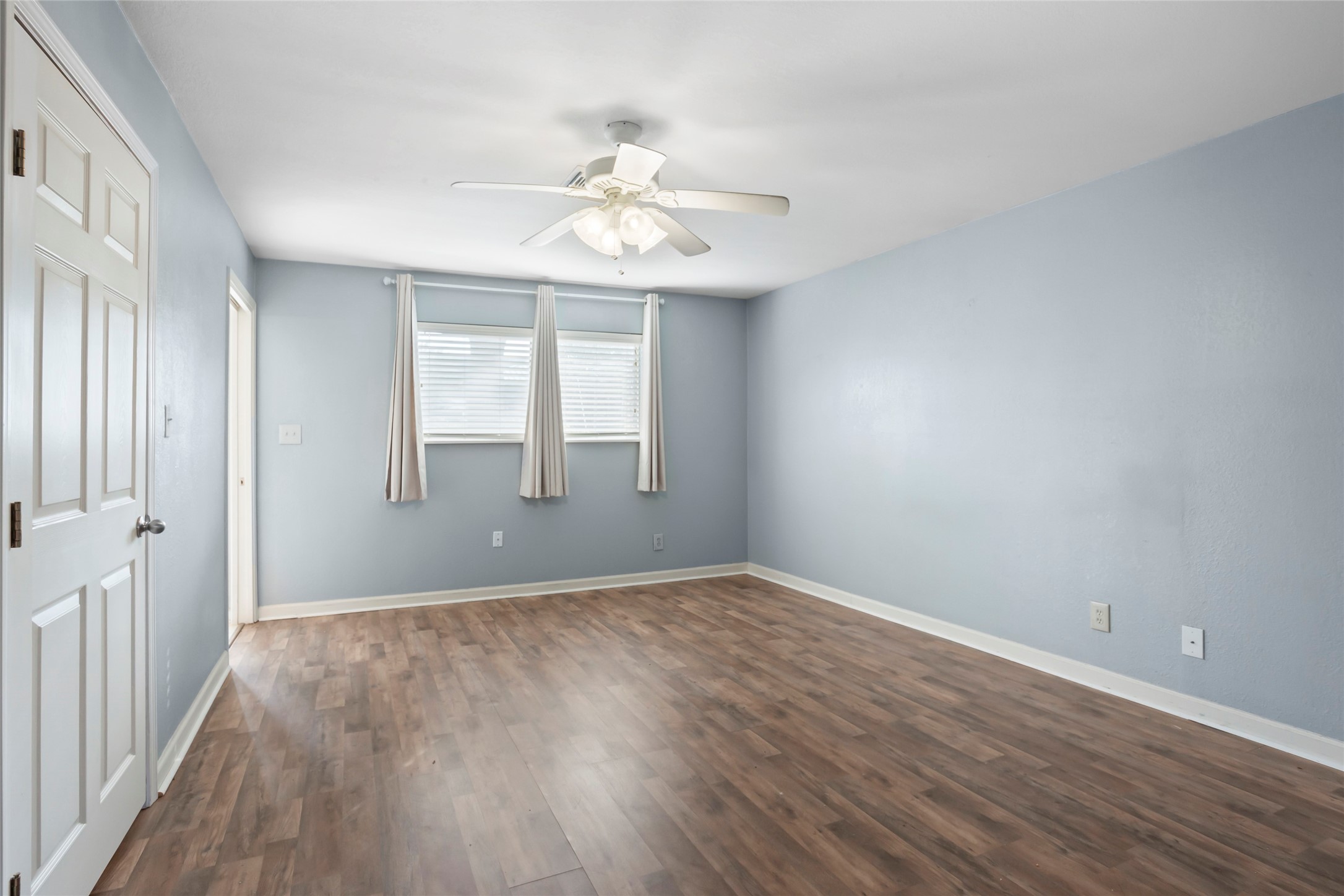 16 Harbor Lane Kemah, TX 77565 - Photo 16 of 31 a view of an empty room with wooden floor