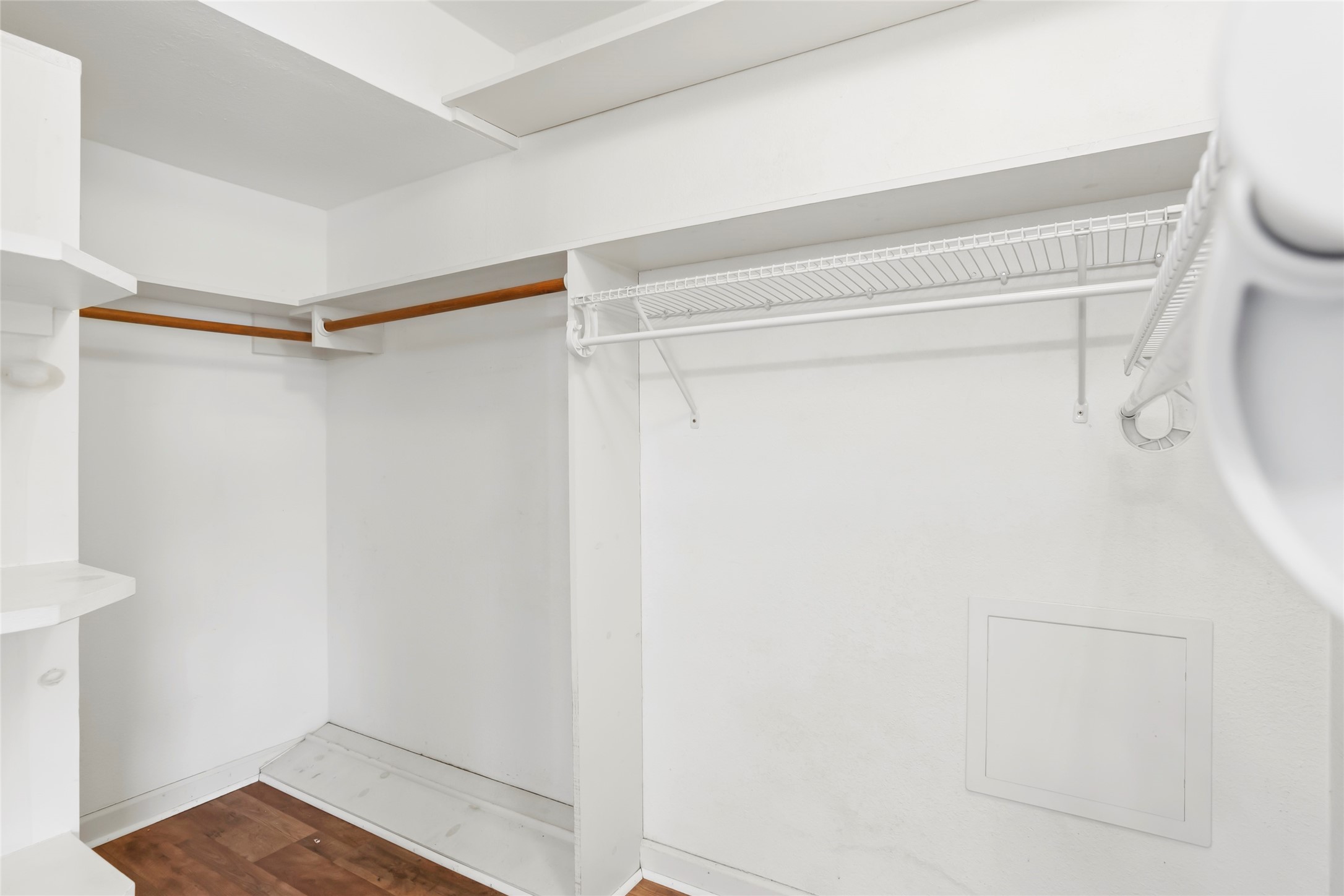 16 Harbor Lane Kemah, TX 77565 - Photo 18 of 31 a view of walk in closet with empty racks