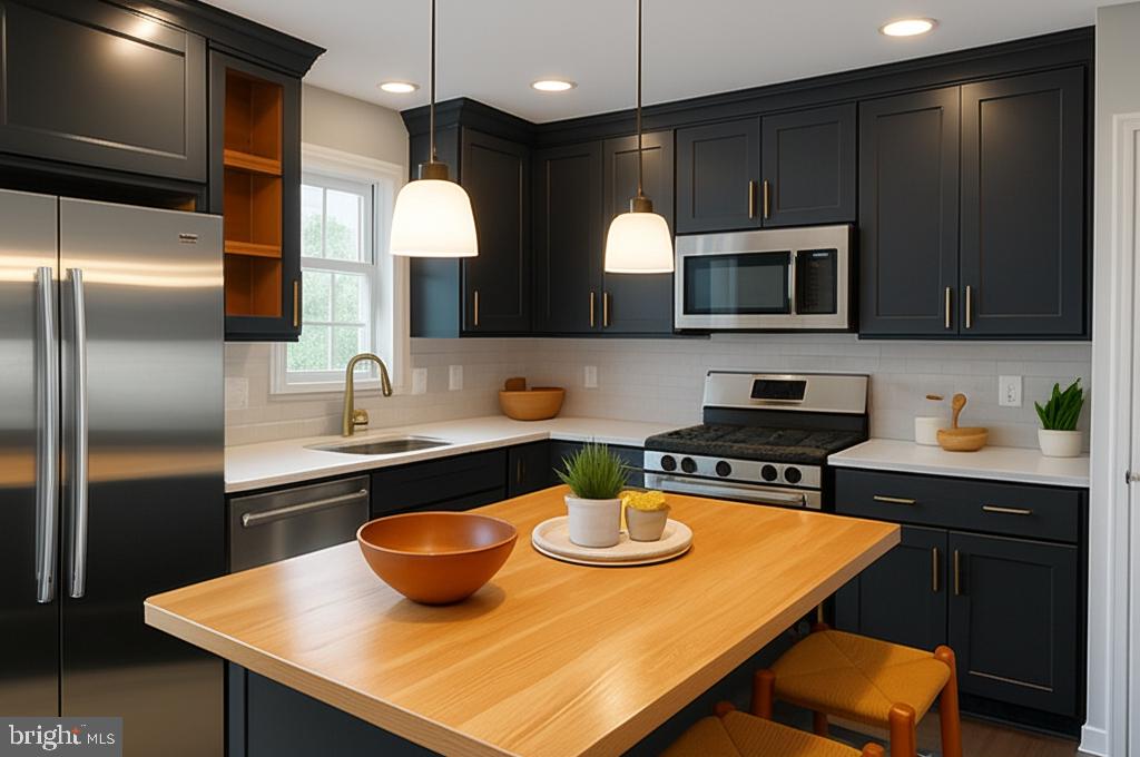 11 Castle Drive Robesonia, PA 19551 - Photo 9 of 19 a kitchen with a sink a stove and chairs