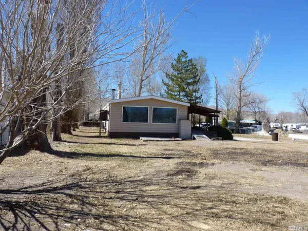 a view of a yard in front of house