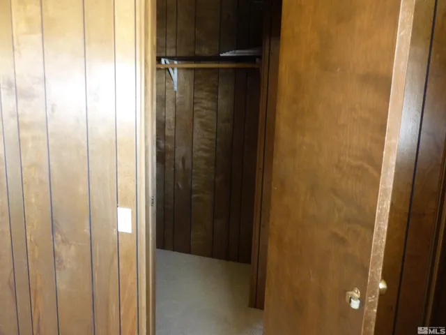 a bathroom with a sink a vanity and a mirror