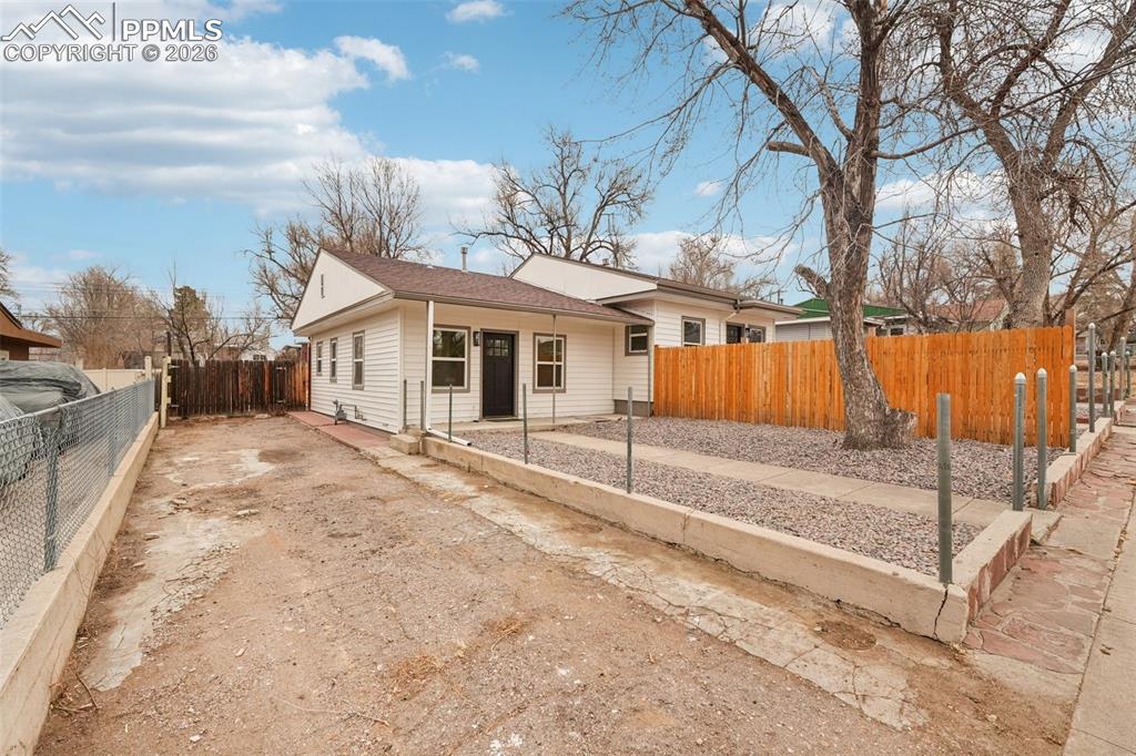 740 East Rio Grande Street Colorado Springs, CO 80903 - Photo 2 of 25 a view of a house with a backyard