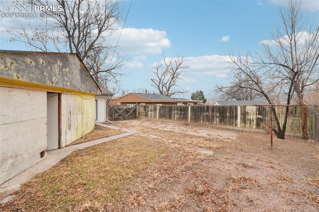 740 East Rio Grande Street Colorado Springs, CO 80903 - Photo 24 of 25 a front view of a house with a yard