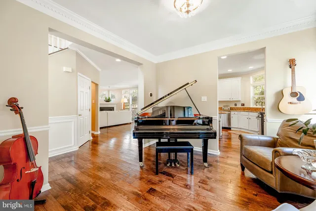 a view of a livingroom with furniture and wooden floor