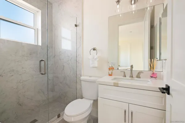 a view of a hallway with washer and dryer