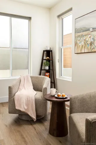 a living room with a couch and a window