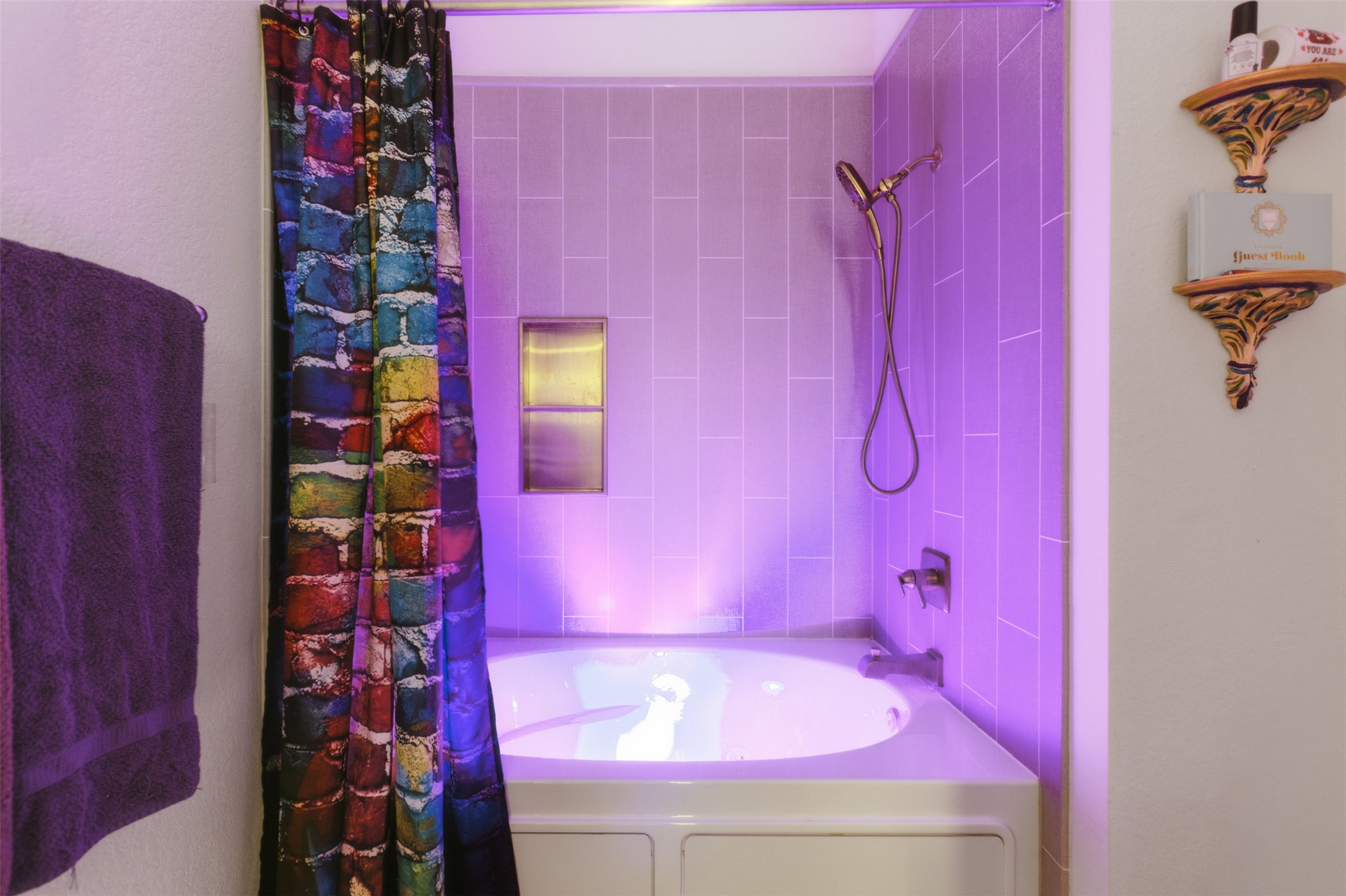 19017 Romano Drive Elgin, TX 78621 - Photo 6 of 33 Built-in soaking tub with subway tile surround, recessed shower niche, and wall-mounted shower fixture