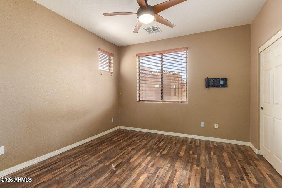9551 East Redfield Road, Unit 1008 Scottsdale, AZ 85260 - Photo 11 of 19 a view of room with window and ceiling fan