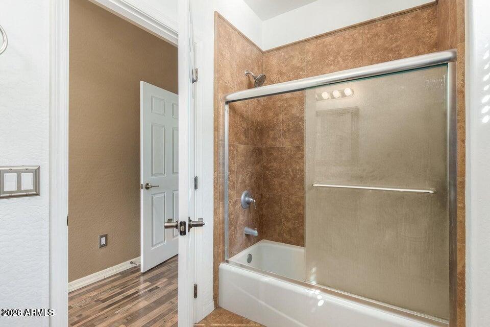9551 East Redfield Road, Unit 1008 Scottsdale, AZ 85260 - Photo 16 of 19 a bathroom with a bathtub