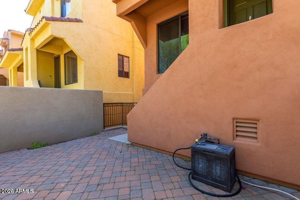 9551 East Redfield Road, Unit 1008 Scottsdale, AZ 85260 - Photo 19 of 19 a view of outdoor space with sliding door and wooden floor