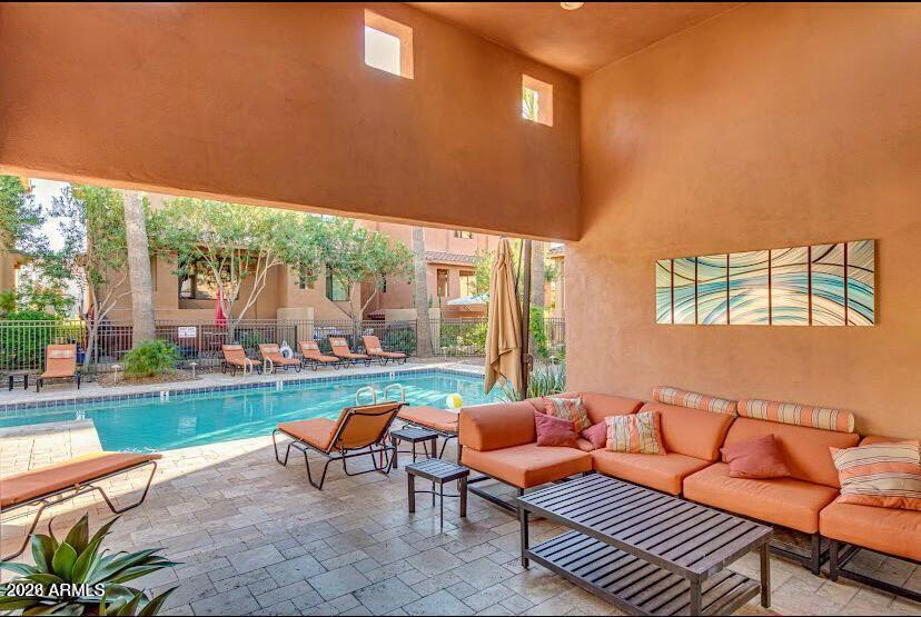 9551 East Redfield Road, Unit 1008 Scottsdale, AZ 85260 - Photo 3 of 19 a outdoor living space with furniture and garden view