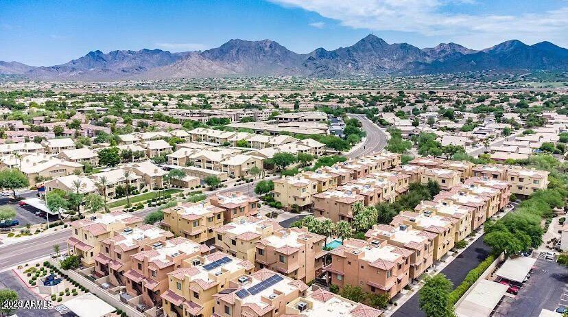 9551 East Redfield Road, Unit 1008 Scottsdale, AZ 85260 - Photo 4 of 19 an aerial view of residential house and sandy dunes