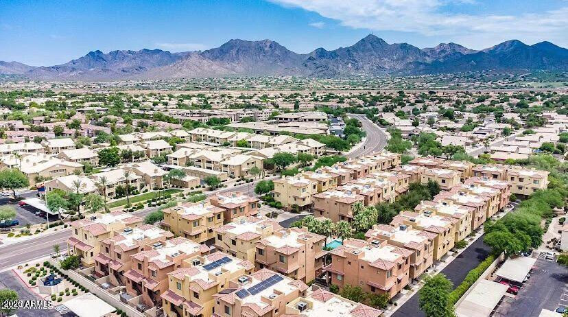 9551 East Redfield Road, Unit 1008 Scottsdale, AZ 85260 - Photo 4 of 19 an aerial view of residential house and sandy dunes