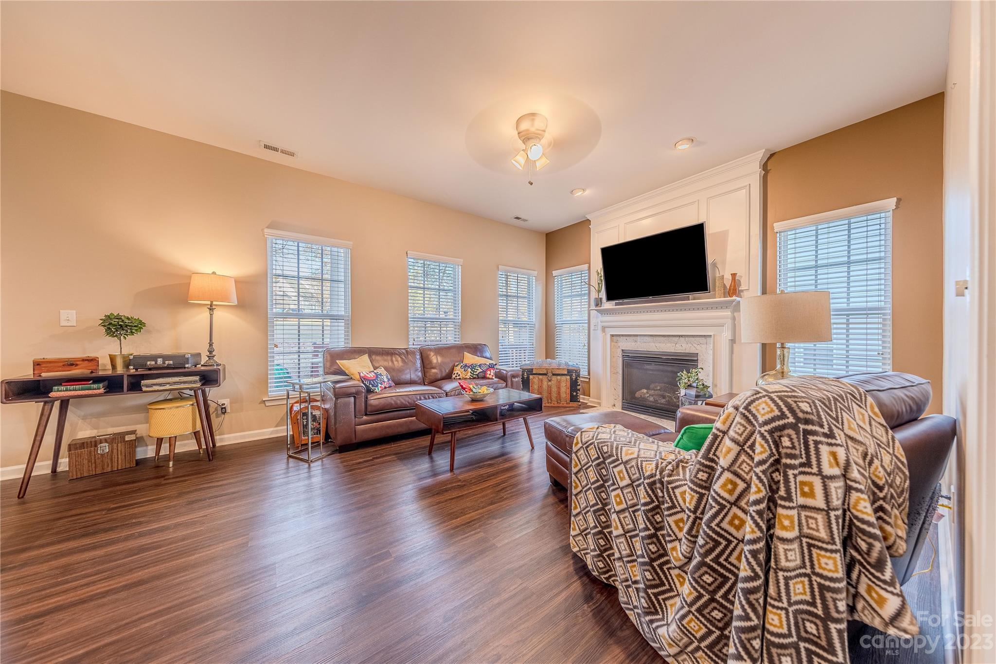 342 Lorraine Road Fort Mill, SC 29708 - Photo 8 of 34 a living room with fireplace furniture and a flat screen tv