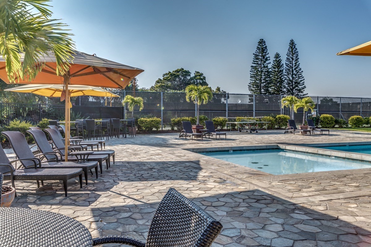 68-1745 Waikoloa Road, Unit L101 Waikoloa, HI 96738 - Photo 17 of 27 a view of a swimming pool with a patio