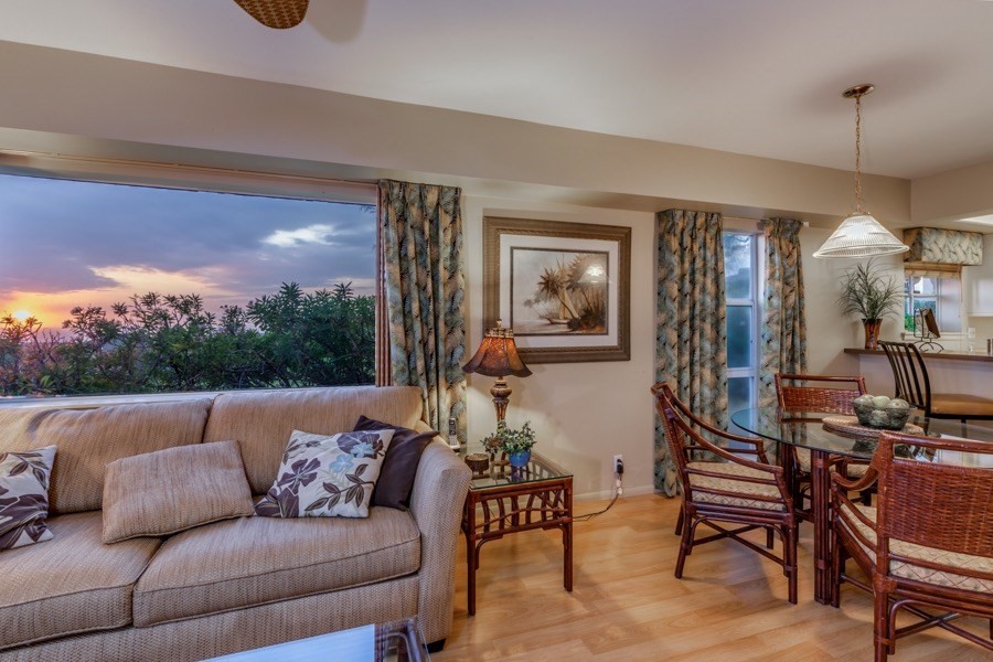 68-1745 Waikoloa Road, Unit L101 Waikoloa, HI 96738 - Photo 3 of 27 a living room with furniture and a floor to ceiling window