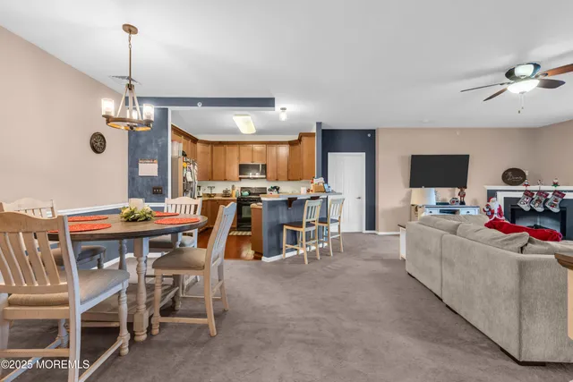 a view of a dining room with furniture window and outside view