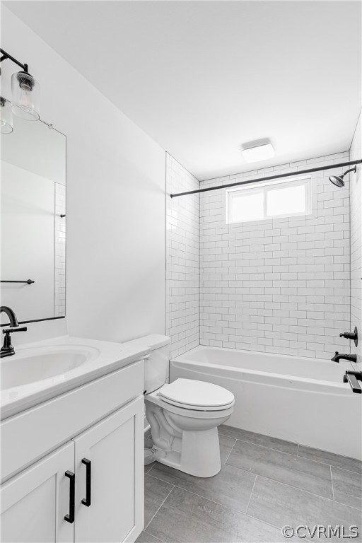 2405 Everett Street Richmond, VA 23224 - Photo 19 of 24 a bathroom with a shower a toilet and a sink