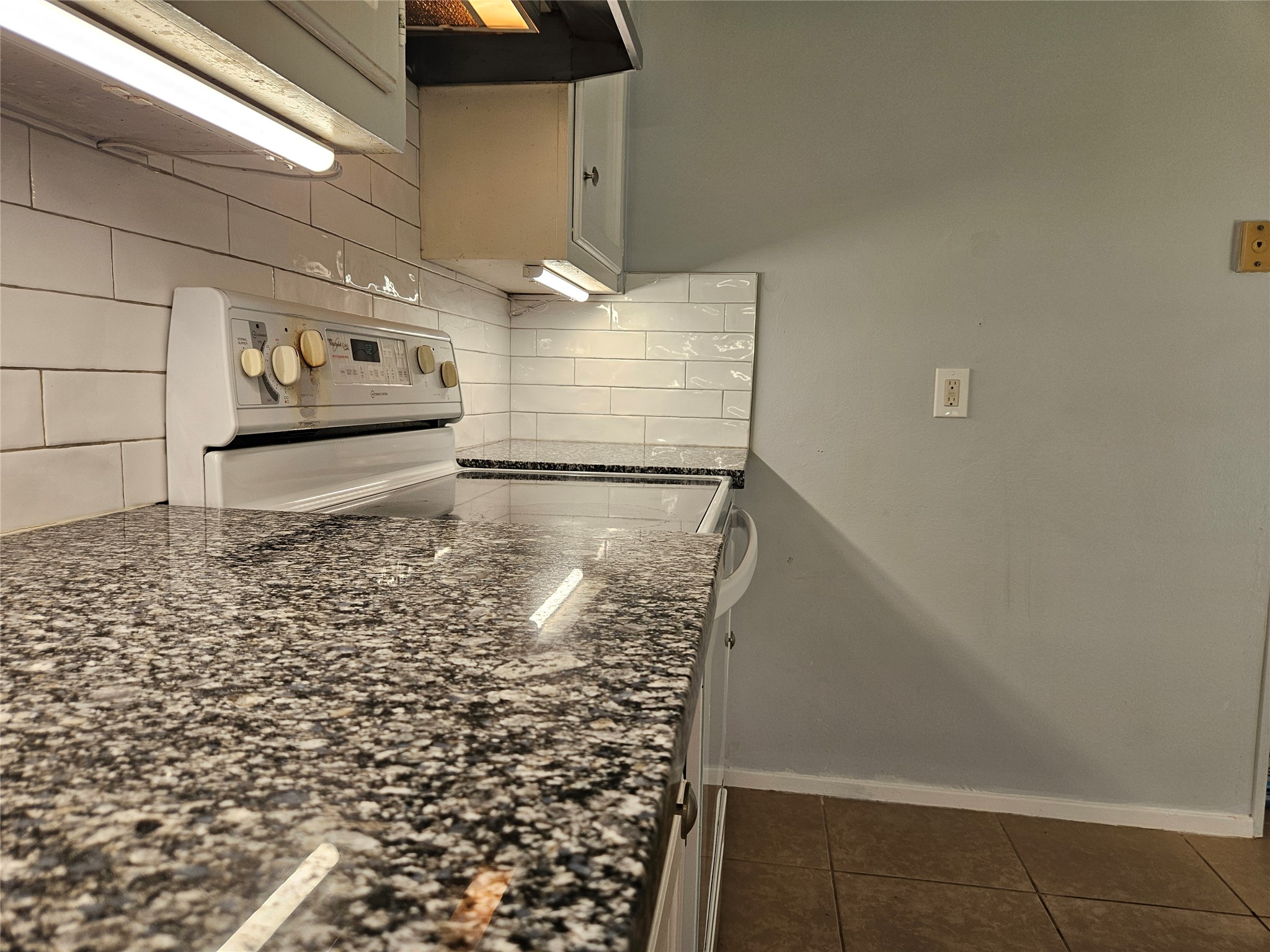 806 Ranch Road, Unit A Georgetown, TX 78628 - Photo 12 of 24 Under-cabinet lighting enhance this functional kitchen space.