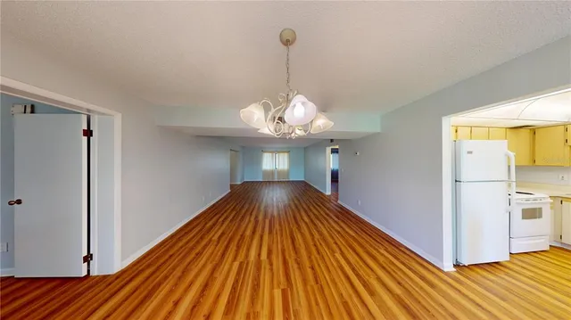 a view of a livingroom with wooden floor