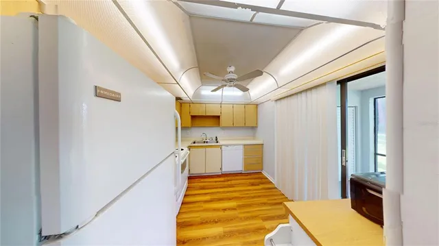 a bathroom with a tub and mirror