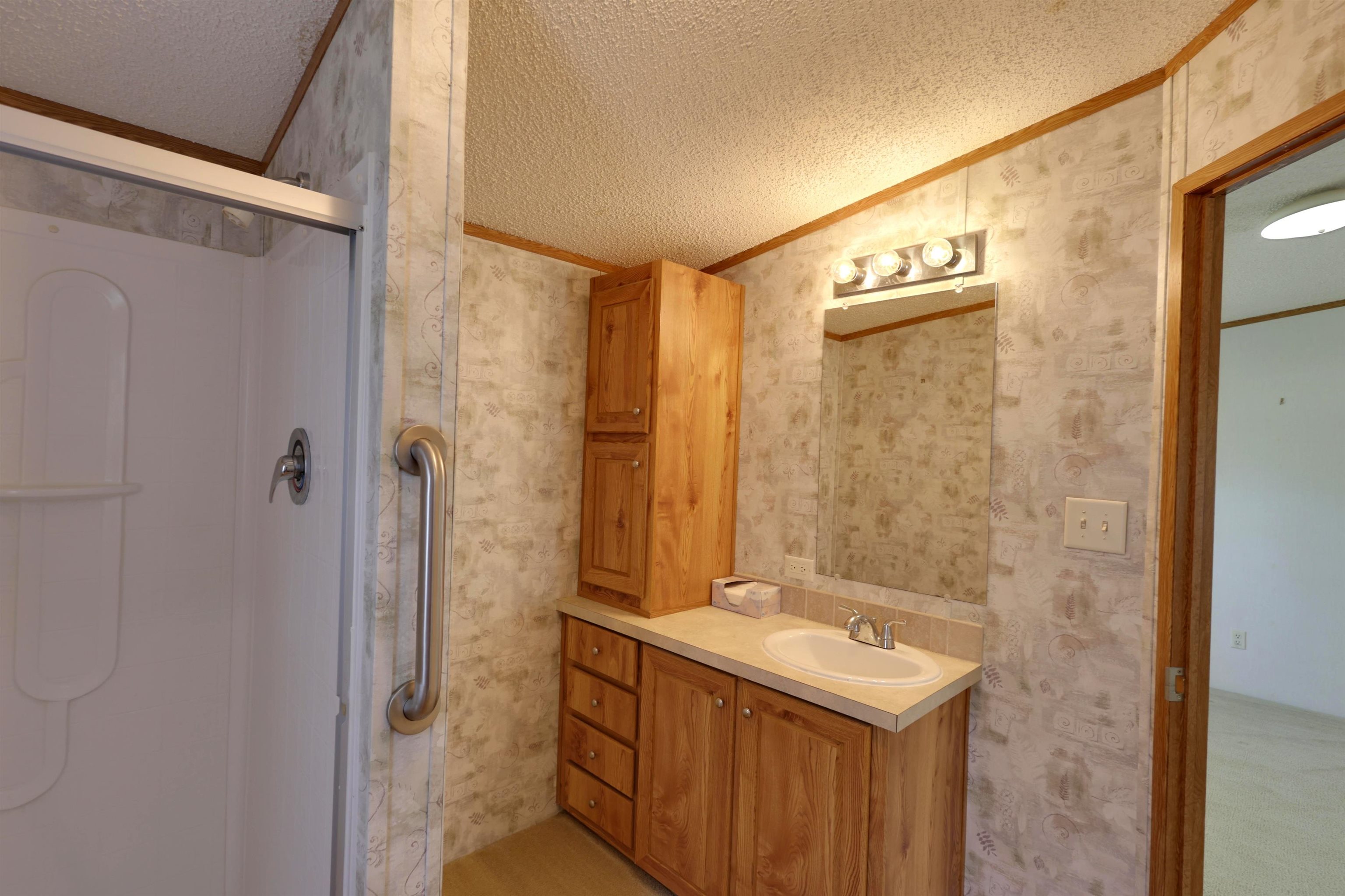 39 Cr 360 Road Iuka, MS 38852 - Photo 20 of 31 a bathroom with a sink and mirror