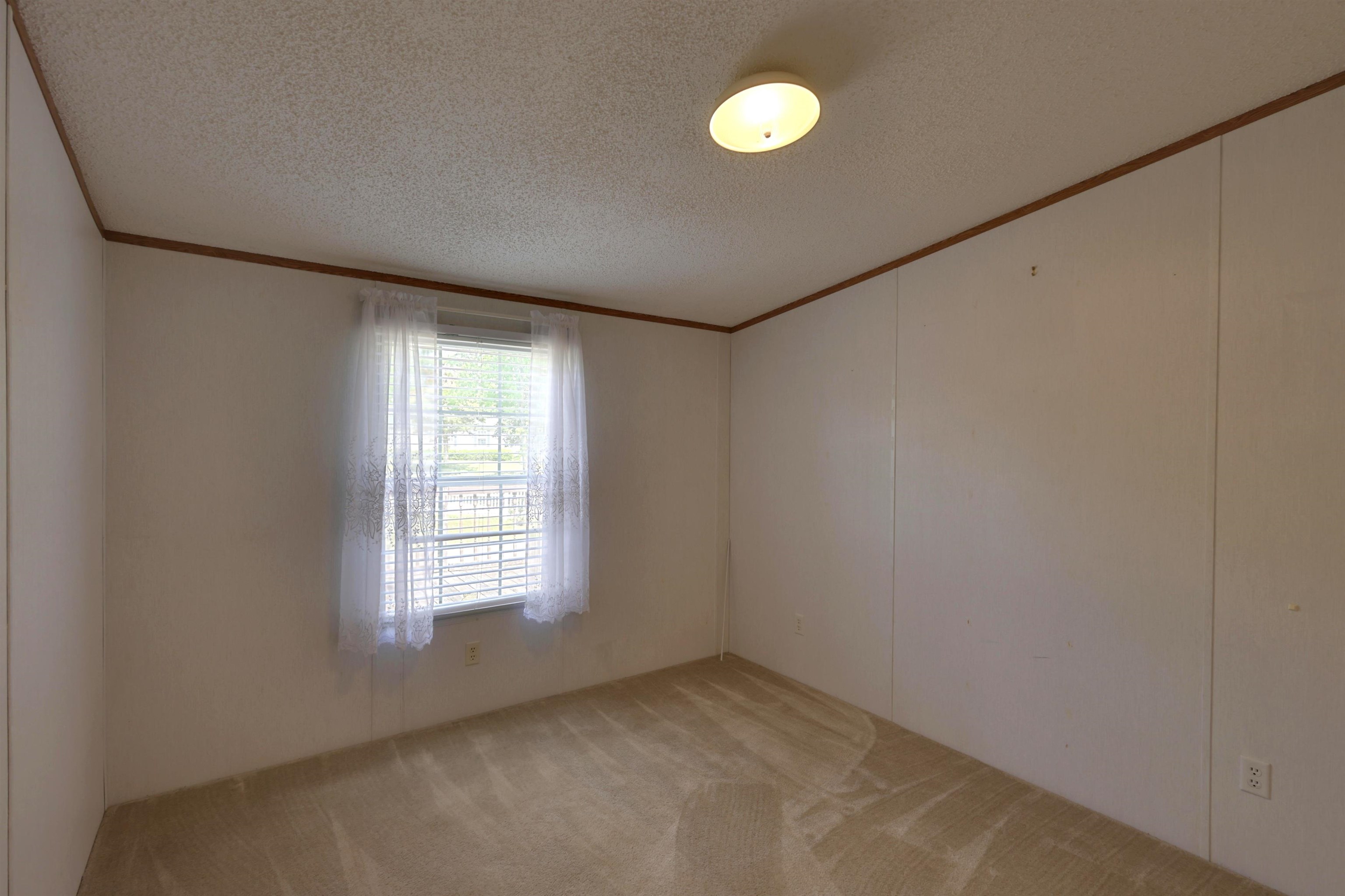 39 Cr 360 Road Iuka, MS 38852 - Photo 22 of 31 a view of an empty room with a window