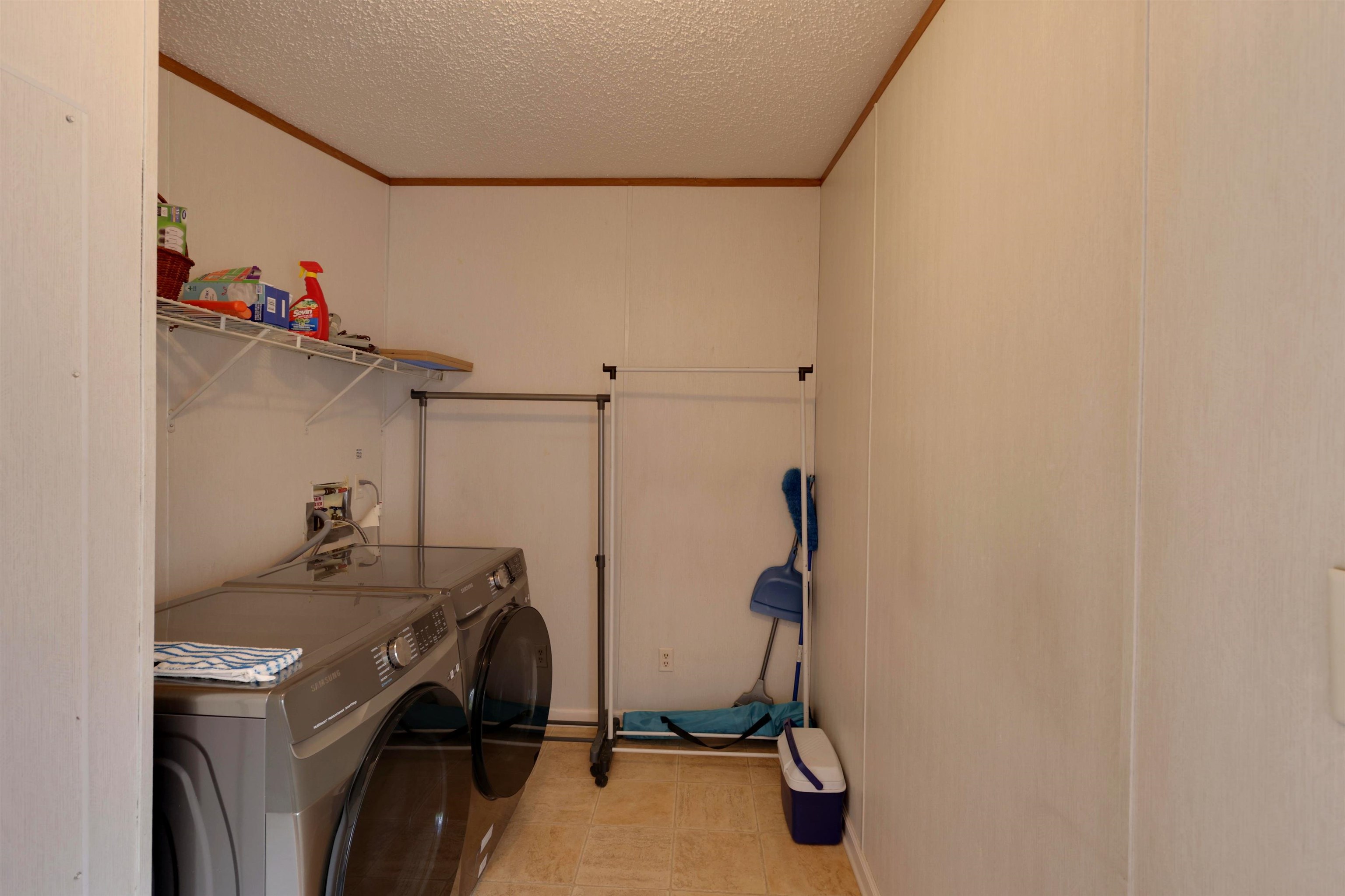 39 Cr 360 Road Iuka, MS 38852 - Photo 27 of 31 a view of storage and utility room with racks on the wall