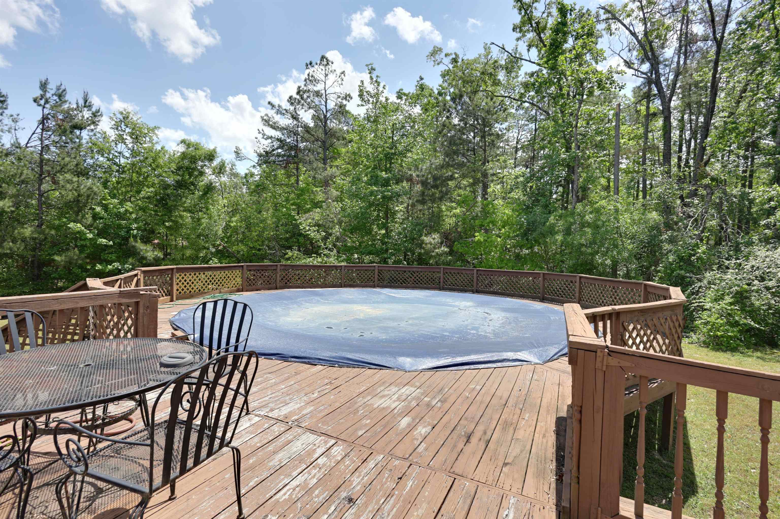 39 Cr 360 Road Iuka, MS 38852 - Photo 29 of 31 a view of balcony with wooden floor and outdoor seating