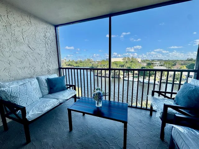 a balcony with furniture