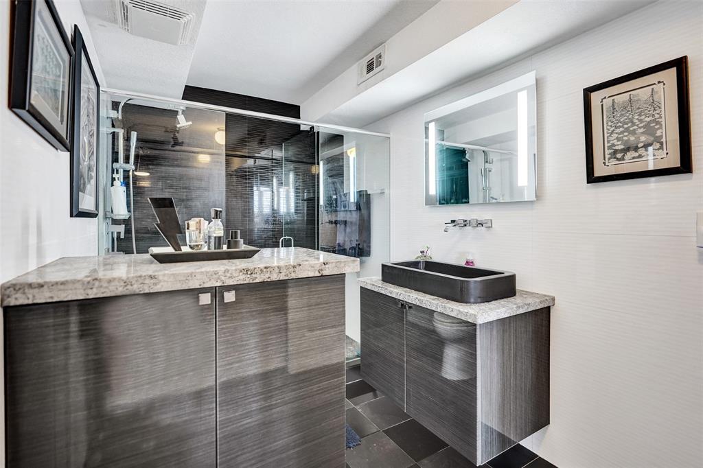 13 Royal Palm Way, Unit 5050 Boca Raton, FL 33432 - Photo 16 of 31 a kitchen with a sink stove and cabinets