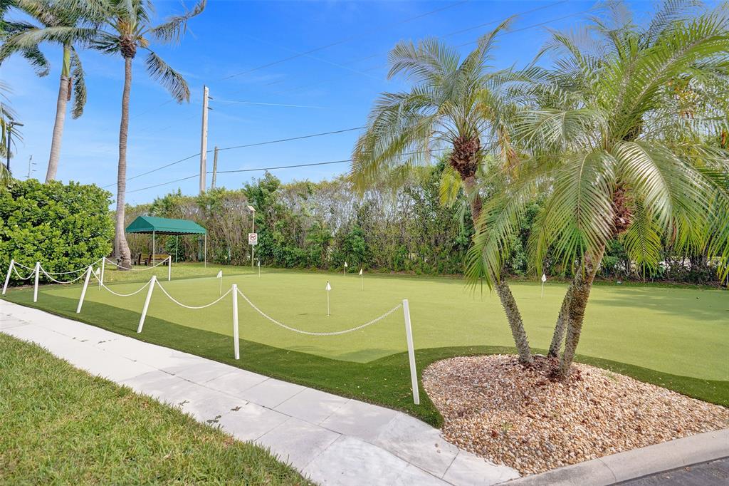13 Royal Palm Way, Unit 5050 Boca Raton, FL 33432 - Photo 28 of 31 a view of a tennis court
