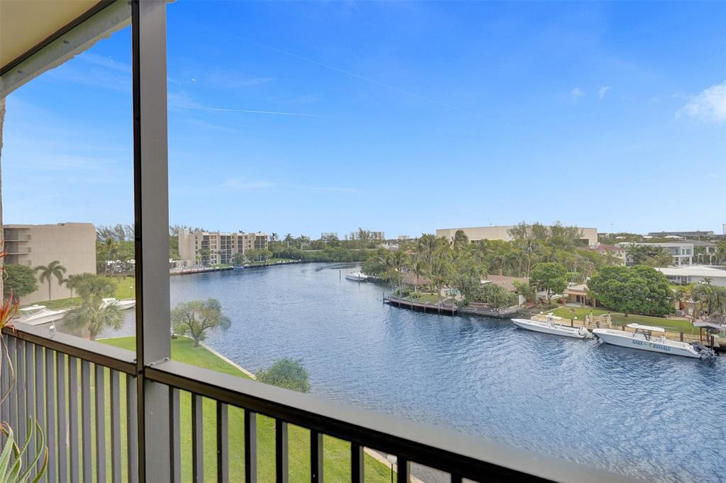13 Royal Palm Way, Unit 5050 Boca Raton, FL 33432 - Photo 4 of 31 a view of a lake from a balcony