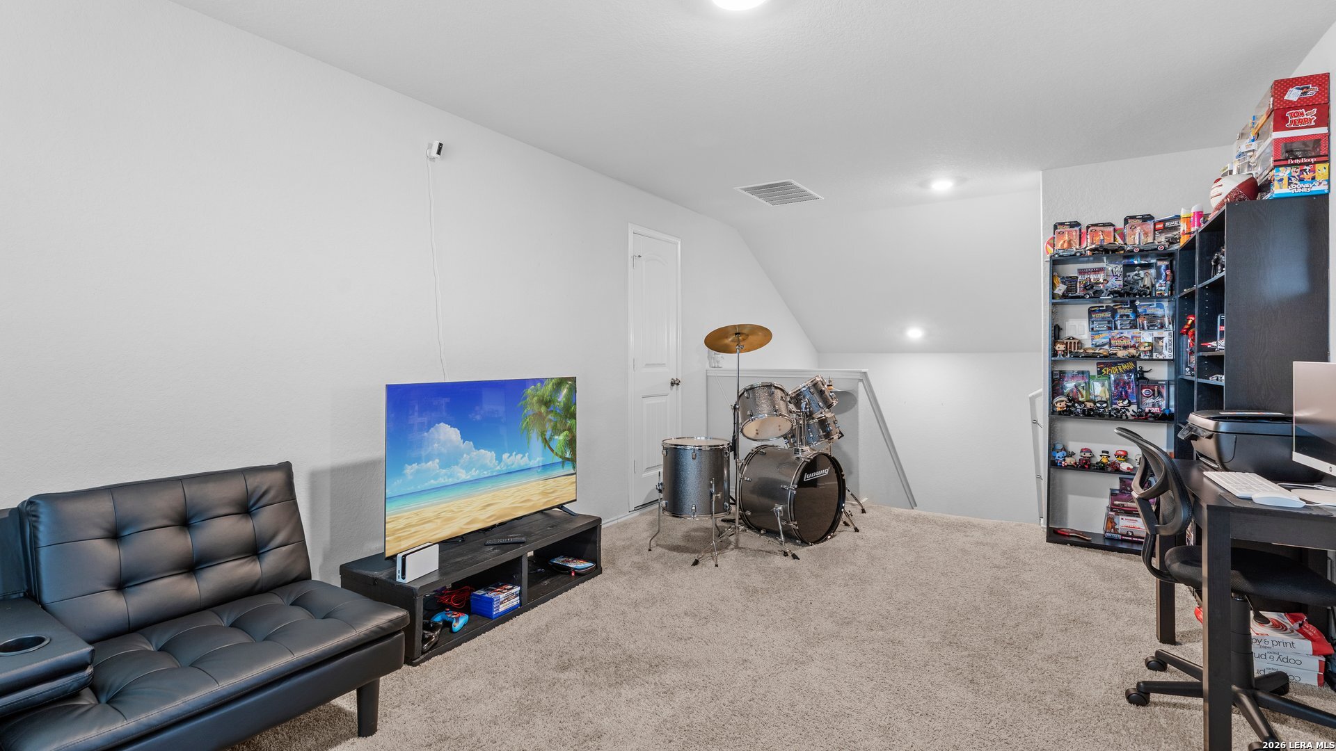 731 Monarch Drive Seguin, TX 78155 - Photo 14 of 21 a living room with furniture and a flat screen tv