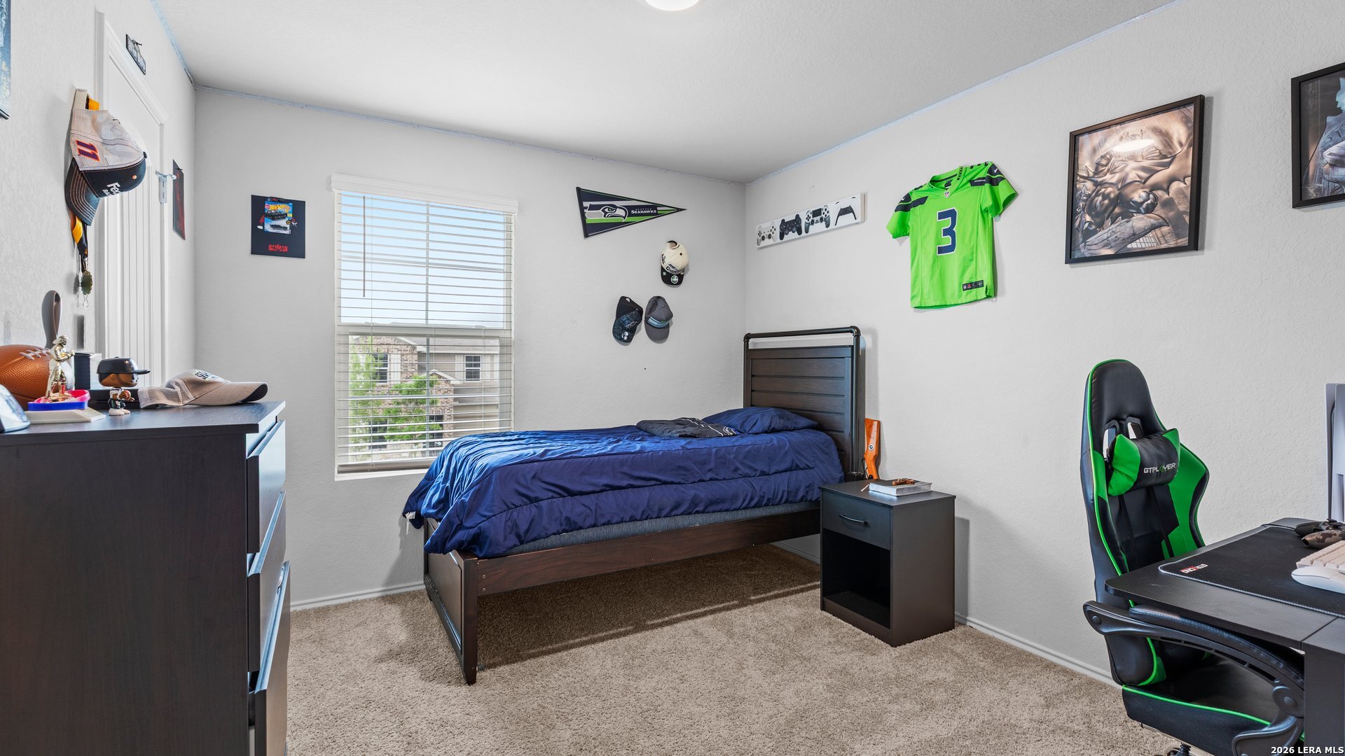 731 Monarch Drive Seguin, TX 78155 - Photo 15 of 21 a bedroom with a bed furniture and a window
