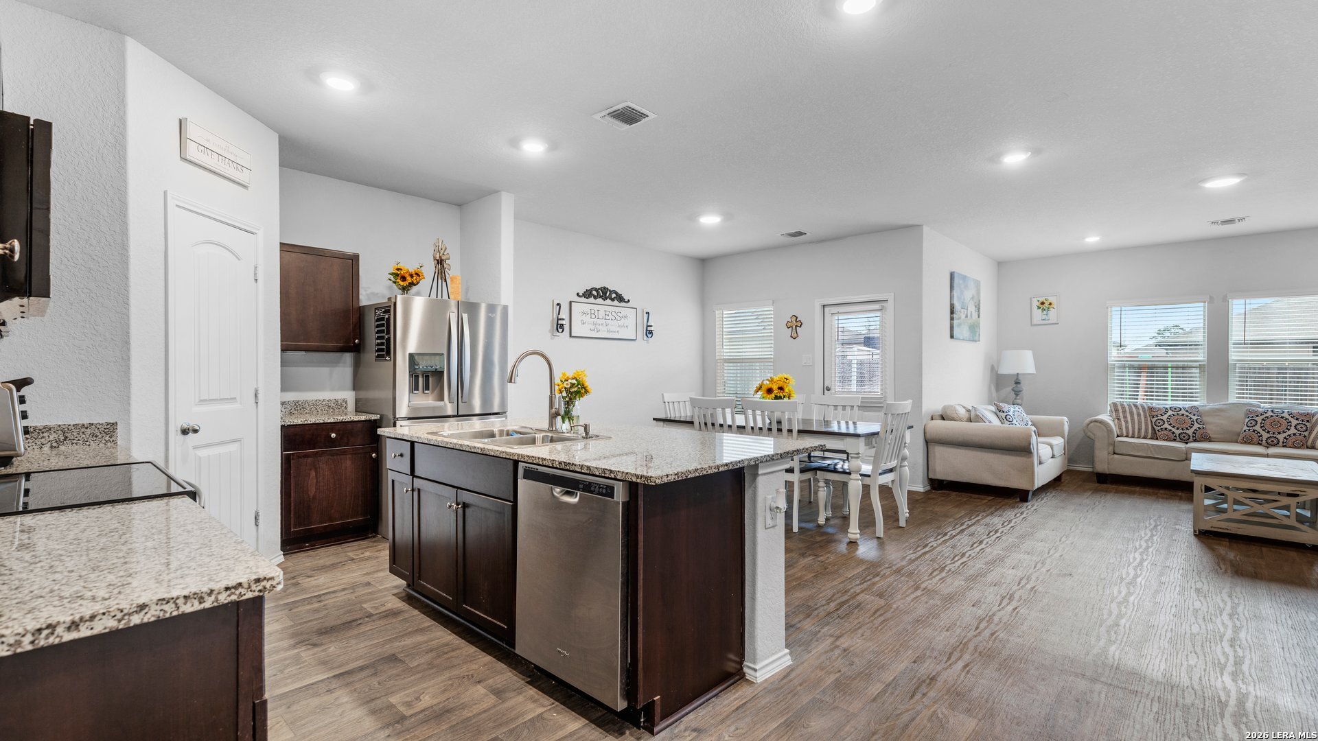 731 Monarch Drive Seguin, TX 78155 - Photo 2 of 21 a kitchen with stainless steel appliances granite countertop lots of counter top space and refrigerator