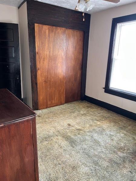 104 Whyle Avenue Uniontown, PA 15401 - Photo 11 of 12 an empty room with windows