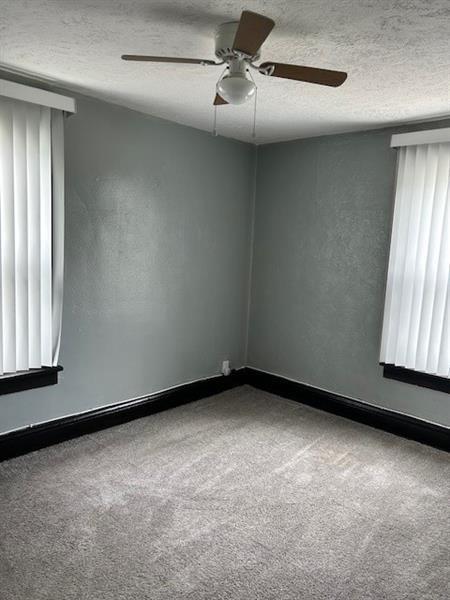 104 Whyle Avenue Uniontown, PA 15401 - Photo 10 of 12 an empty room with a window